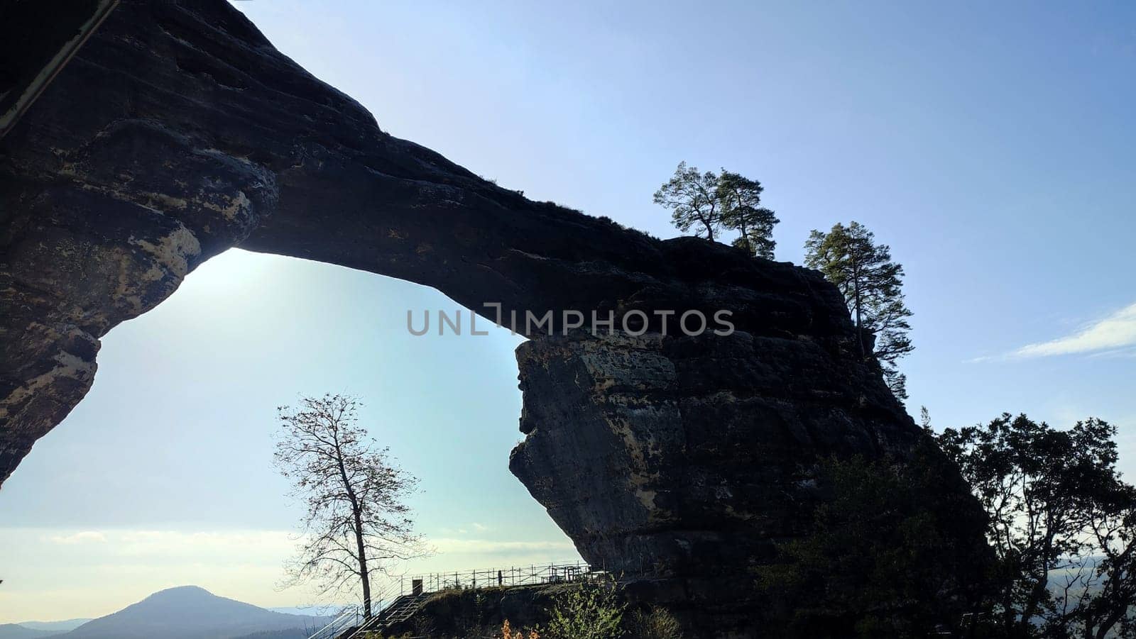 Rock arch landscape nature background clouds mountain landscape green summer travel Czech Republic Europe . High quality photo