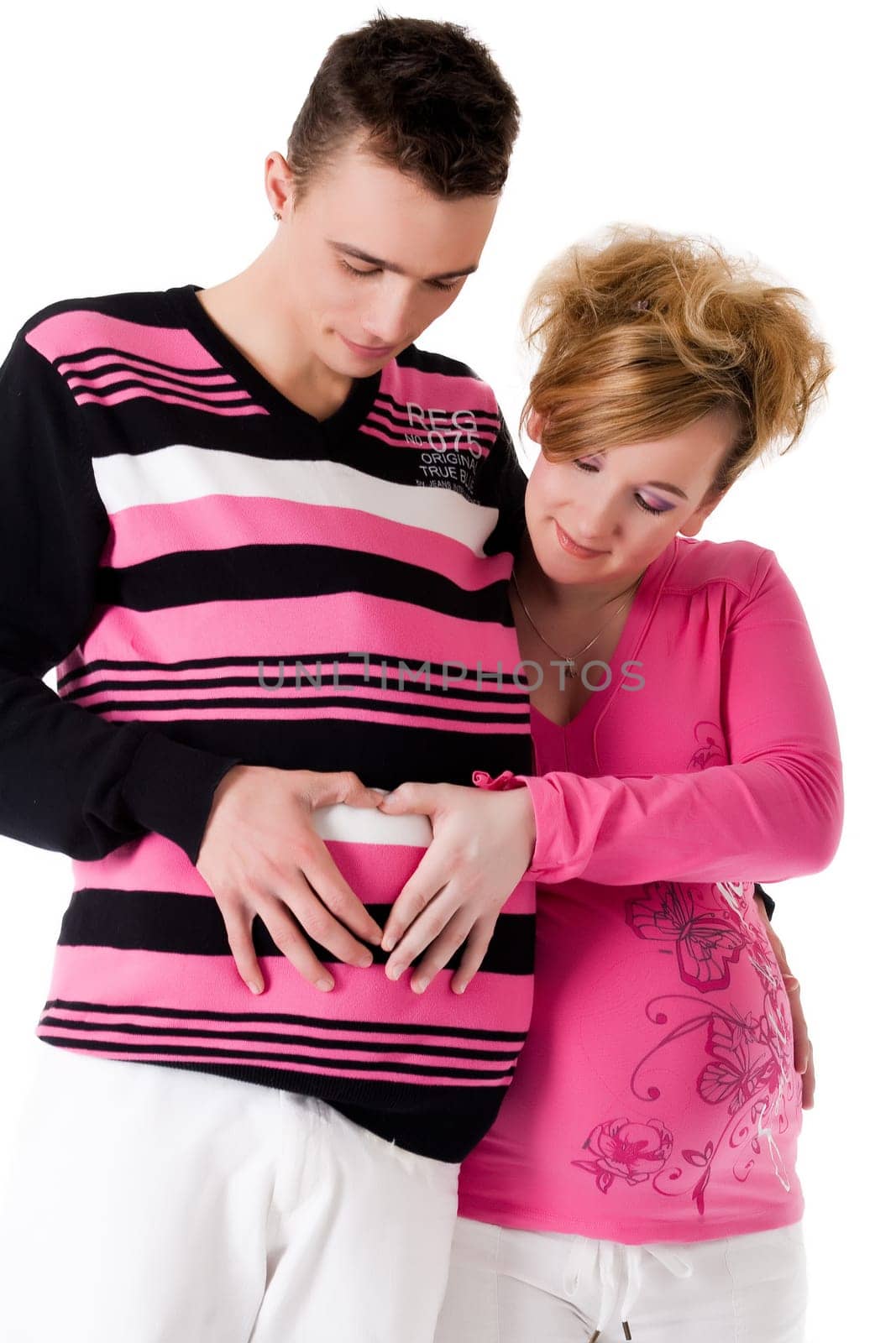 Pregnant couple with a babycap