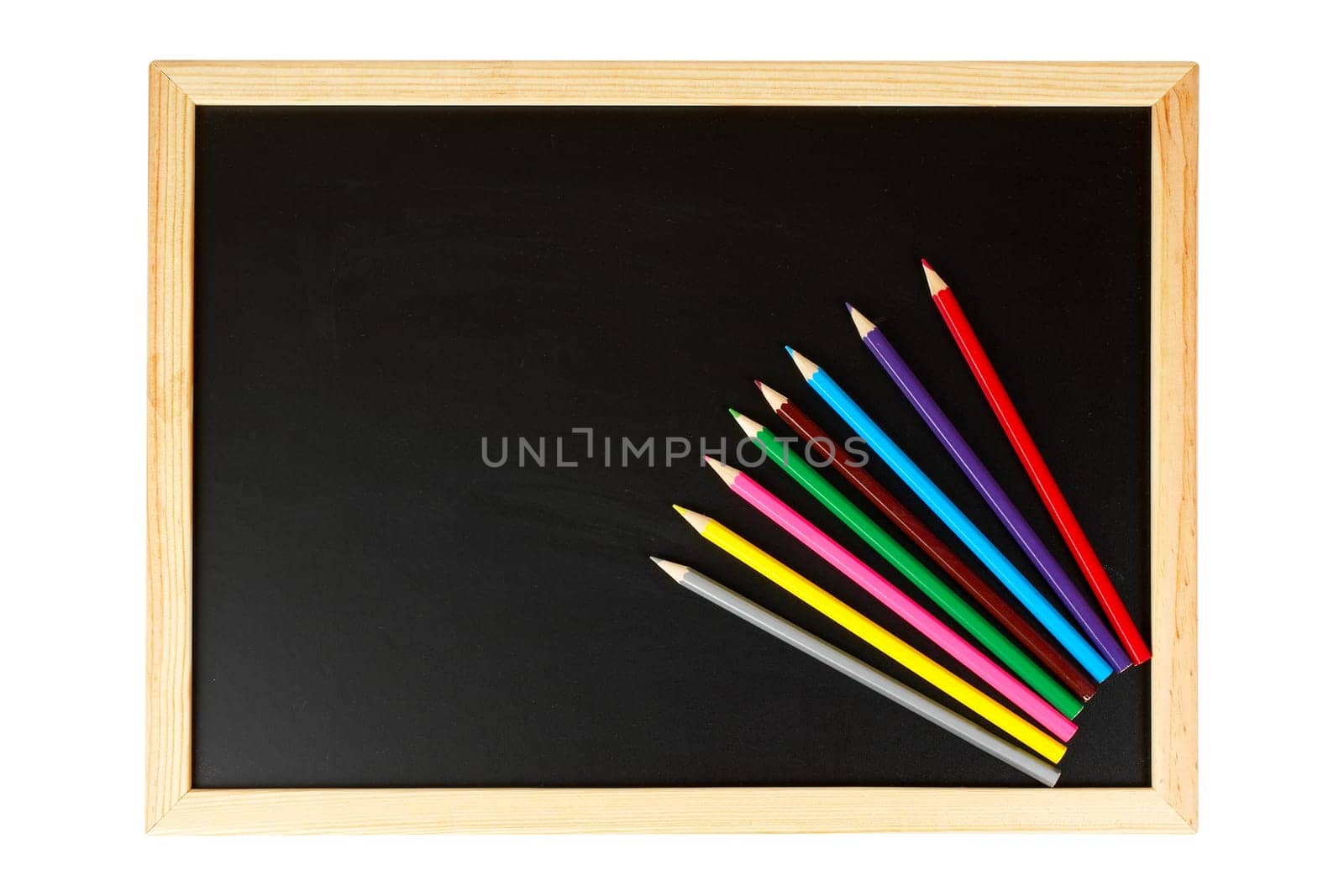 Chalkboard and multicolored pencils