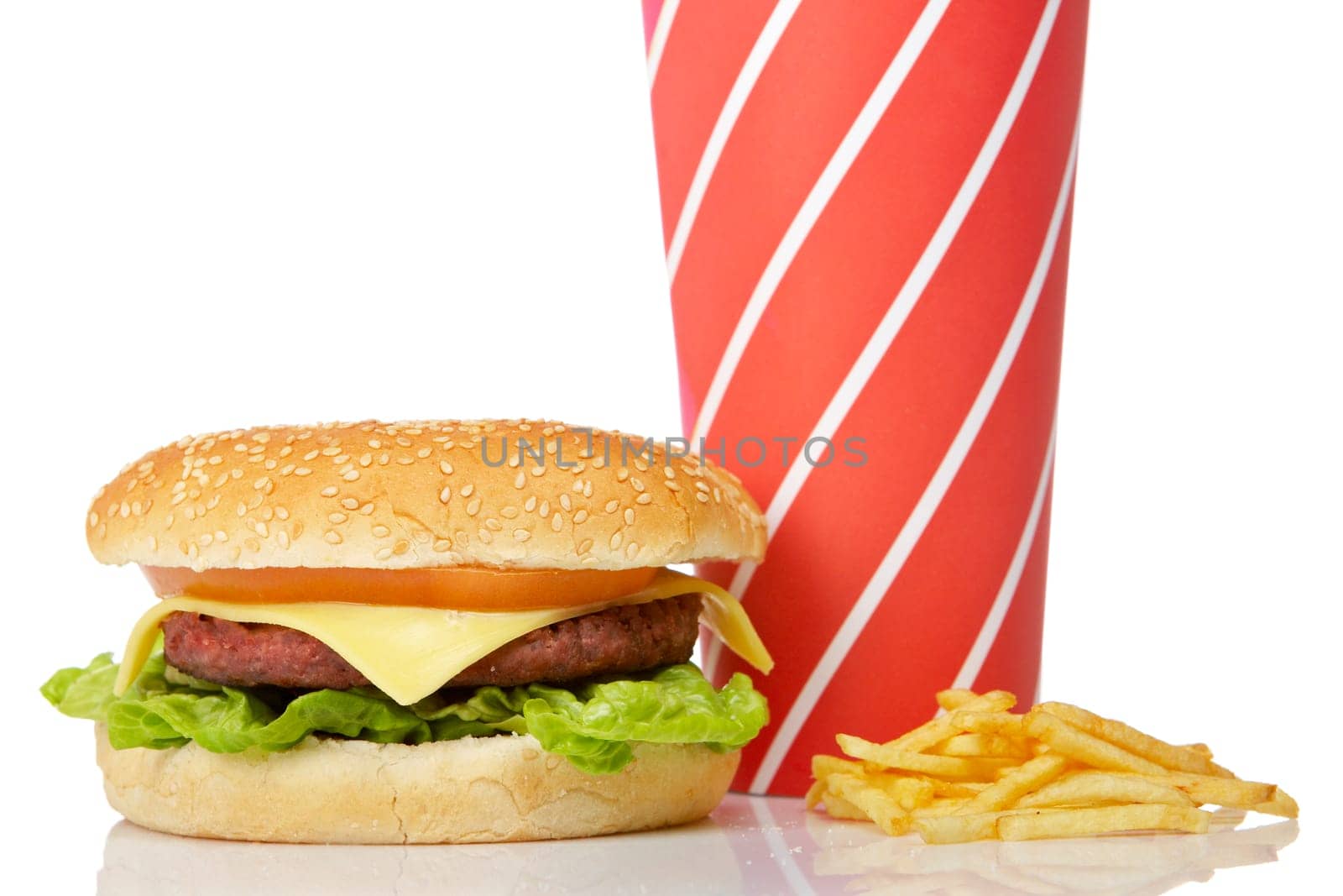 Cheeseburger, soda drinks and french fries