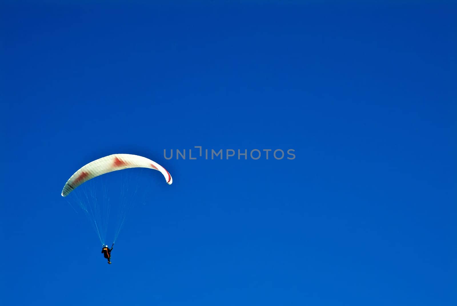 Hang gliders above the clouds