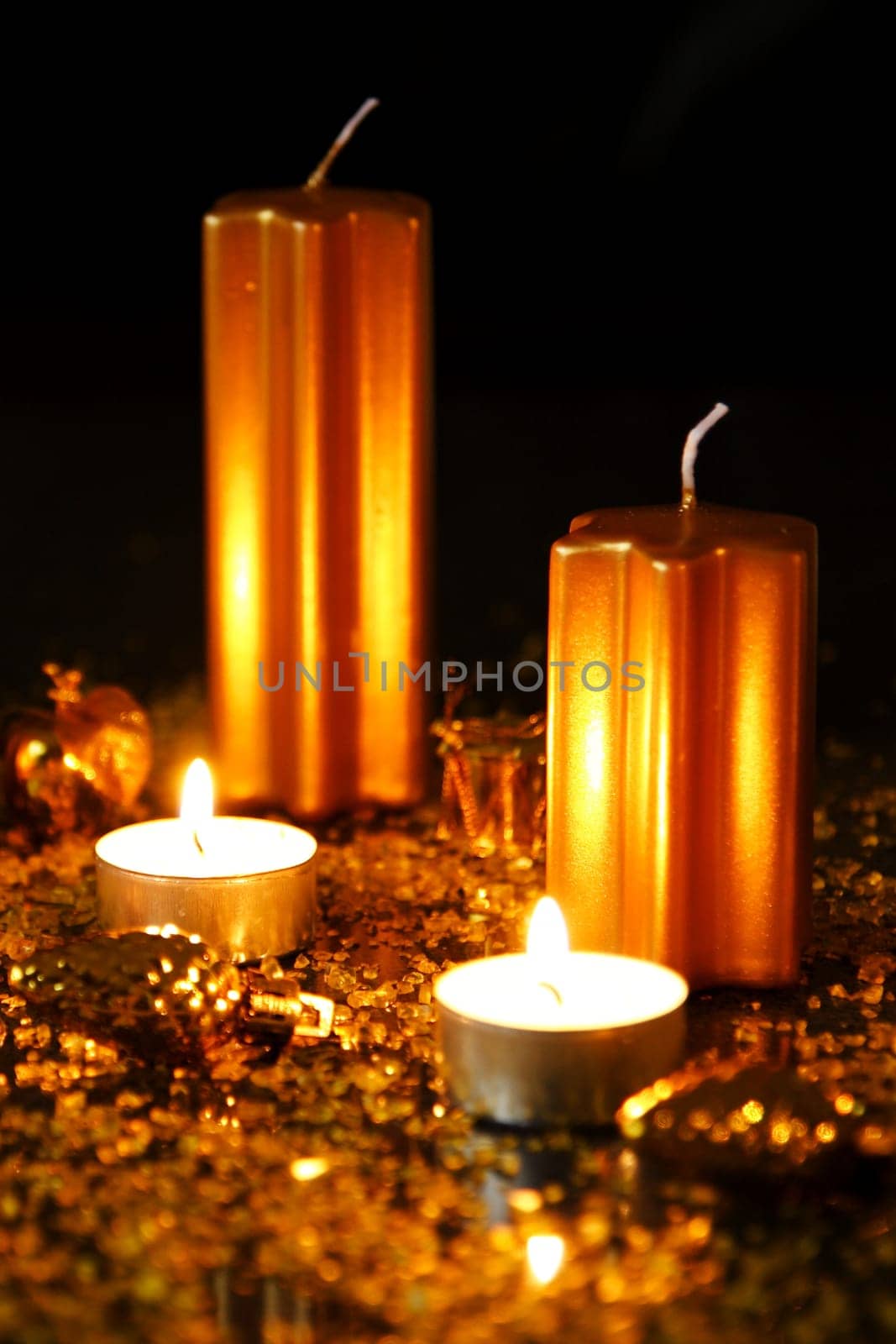 Tea lights with Christmas candles and Christmas decorations