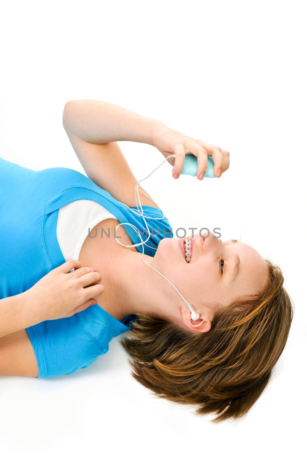 Teenage girl listening to music