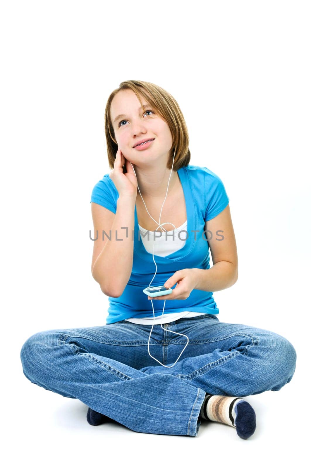 Teenage girl listening to music