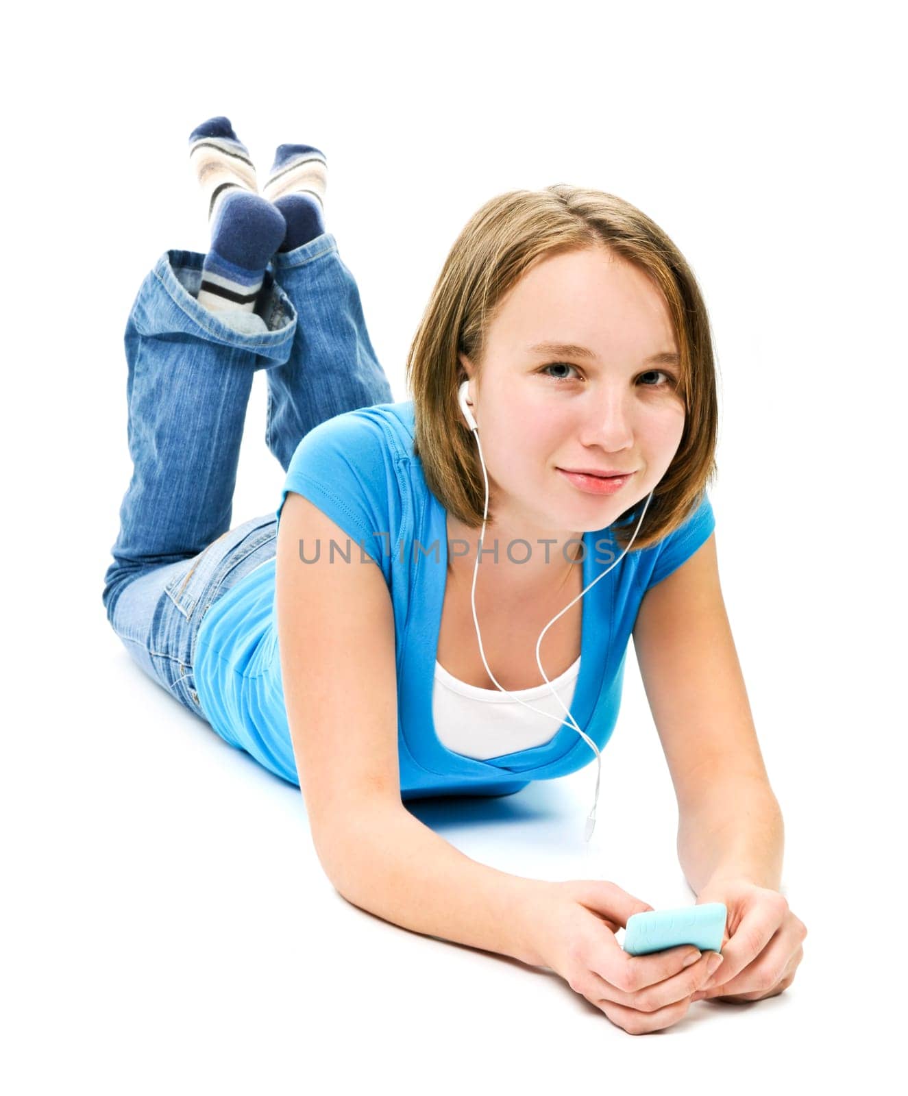 Teenage girl listening to music