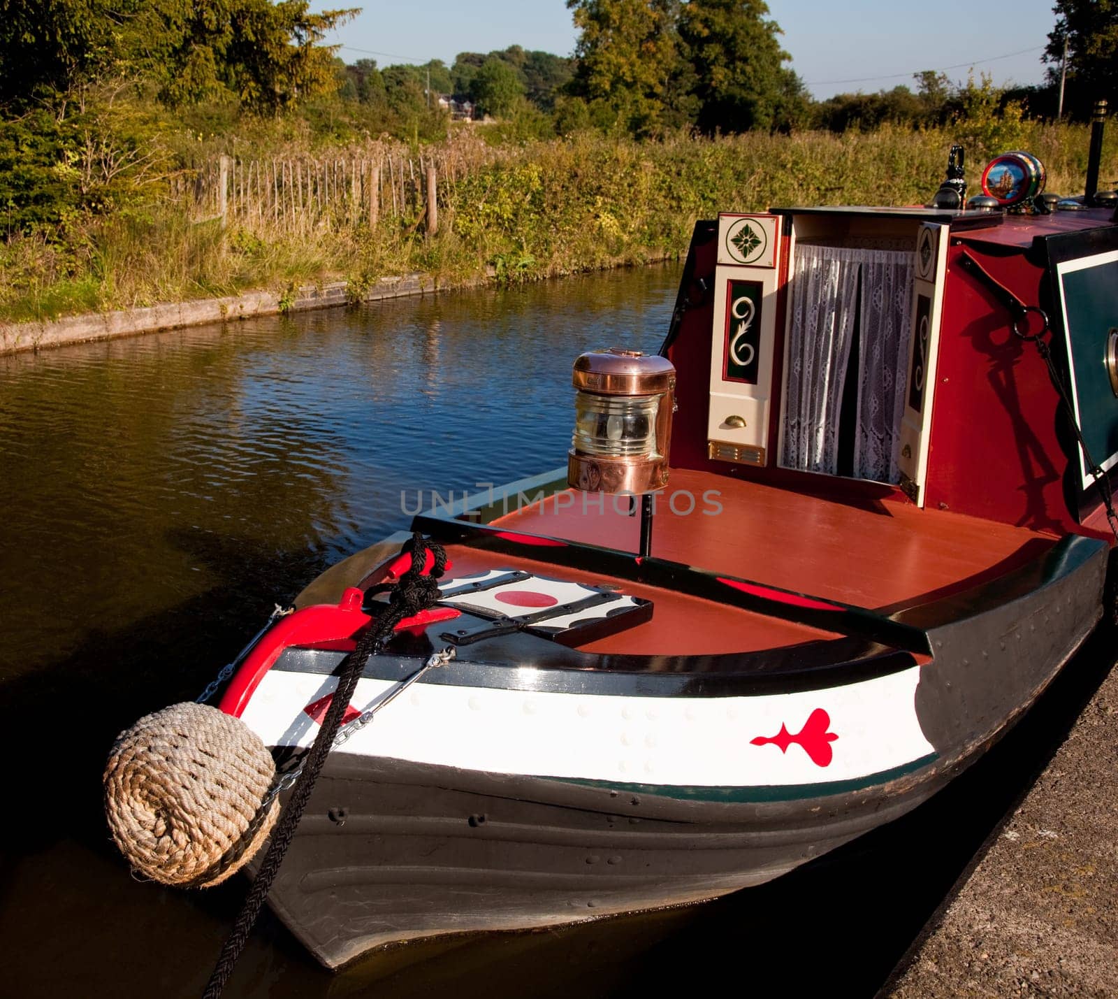 Ornate brass driving lamp on bow of canal barge