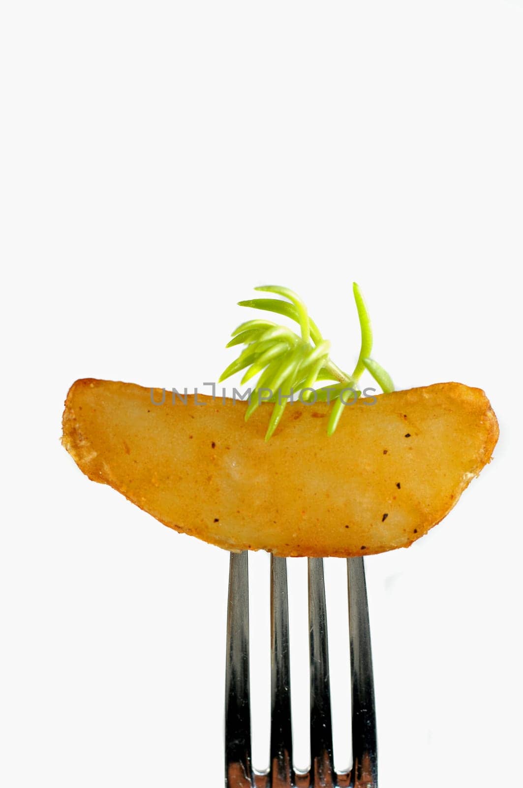 Potato wedge on a fork
