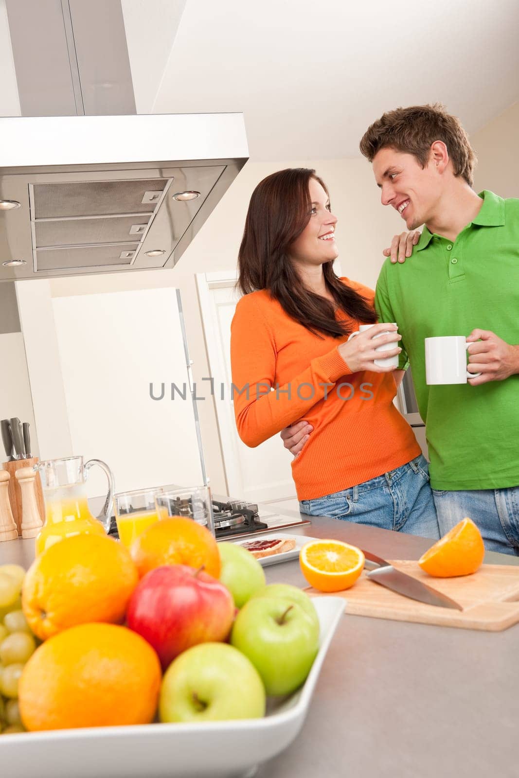 Happy couple drinking coffee