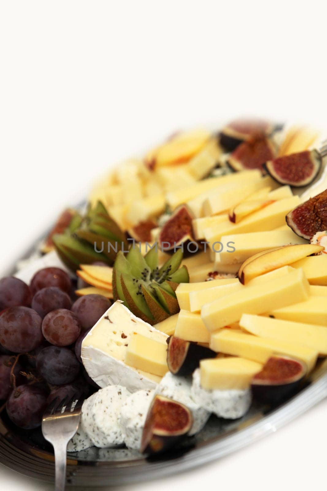 Cheese platter with grapes
