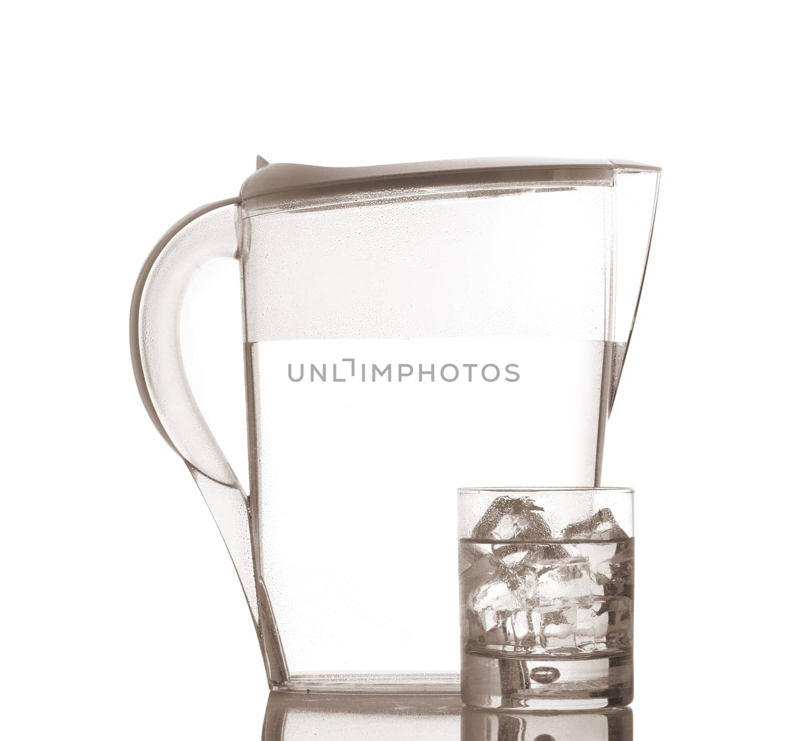 Pitcher and glass with droplets