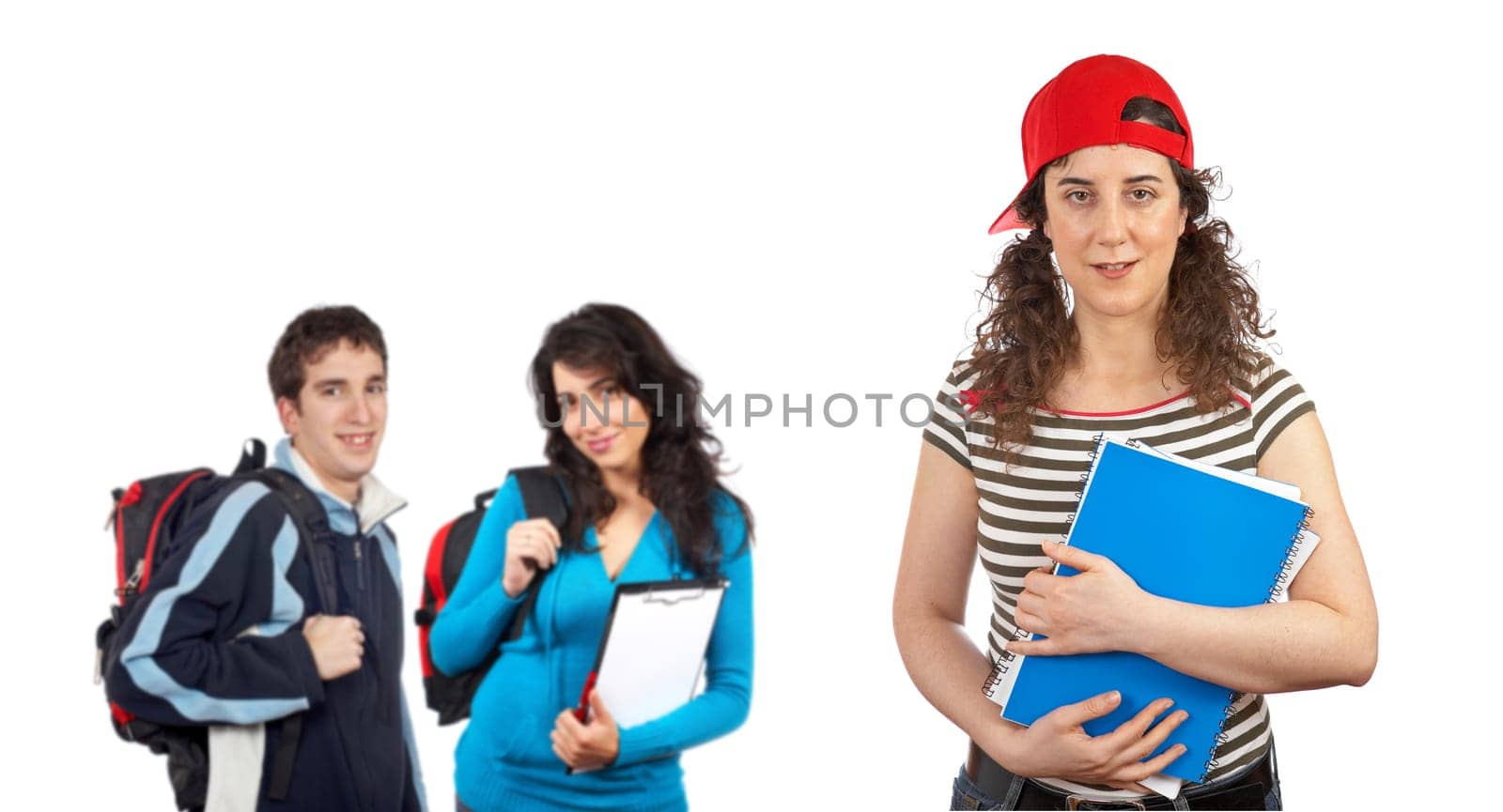 Three students with books and backpacks