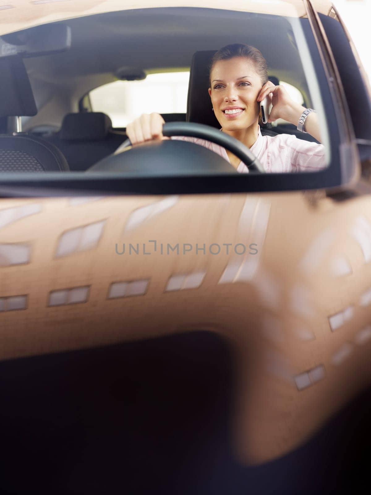 woman driving car and talking on mobile phone. Copy space