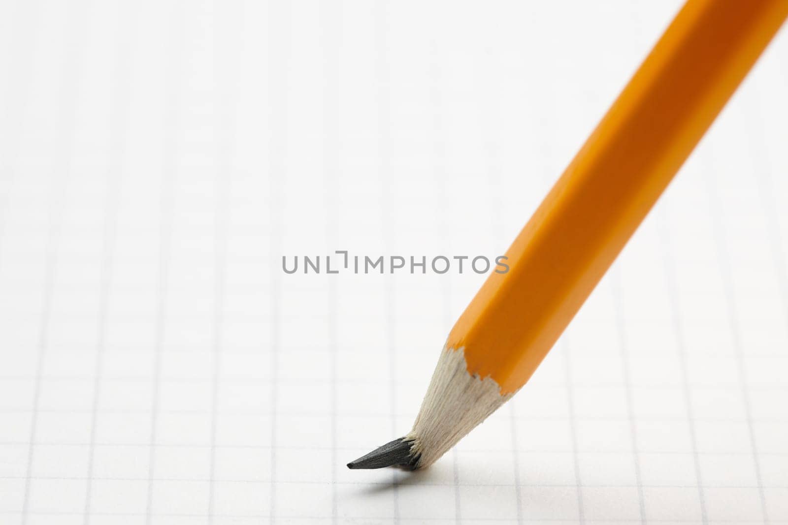 close up of pencil with broken point on paper. Selective focus