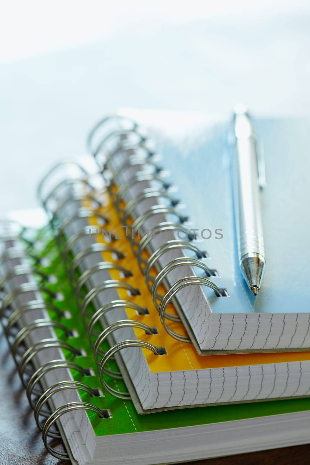 pen on top of note pads. Copy space