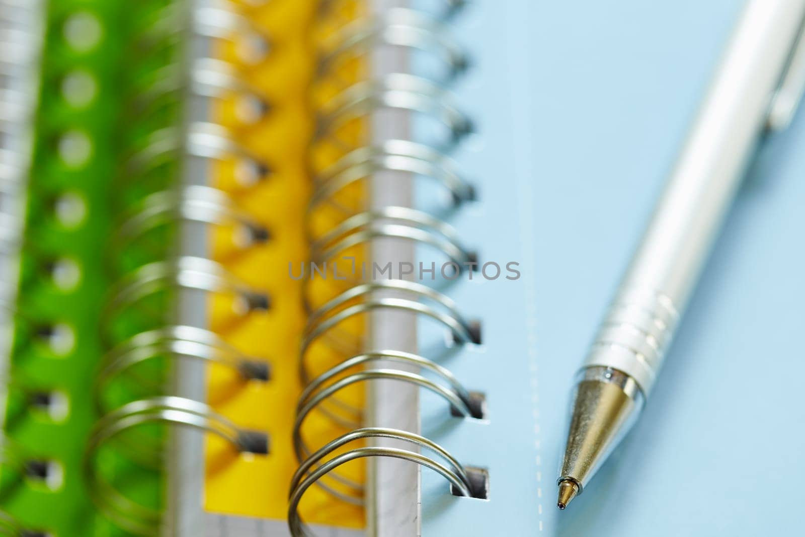 pen on top of ring binders