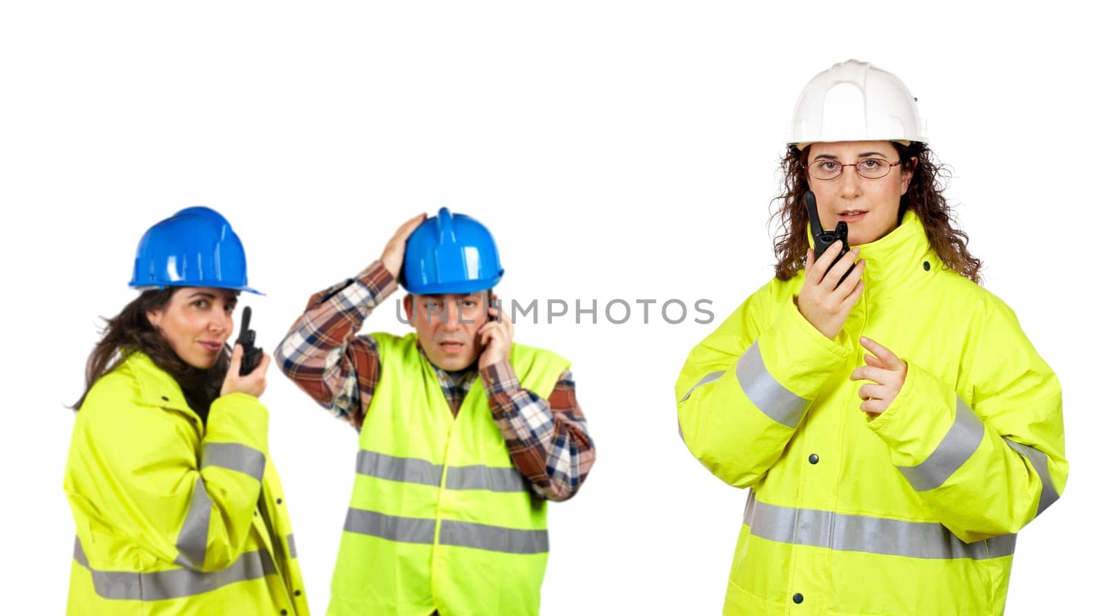Construction workers talking with a walkie talkie