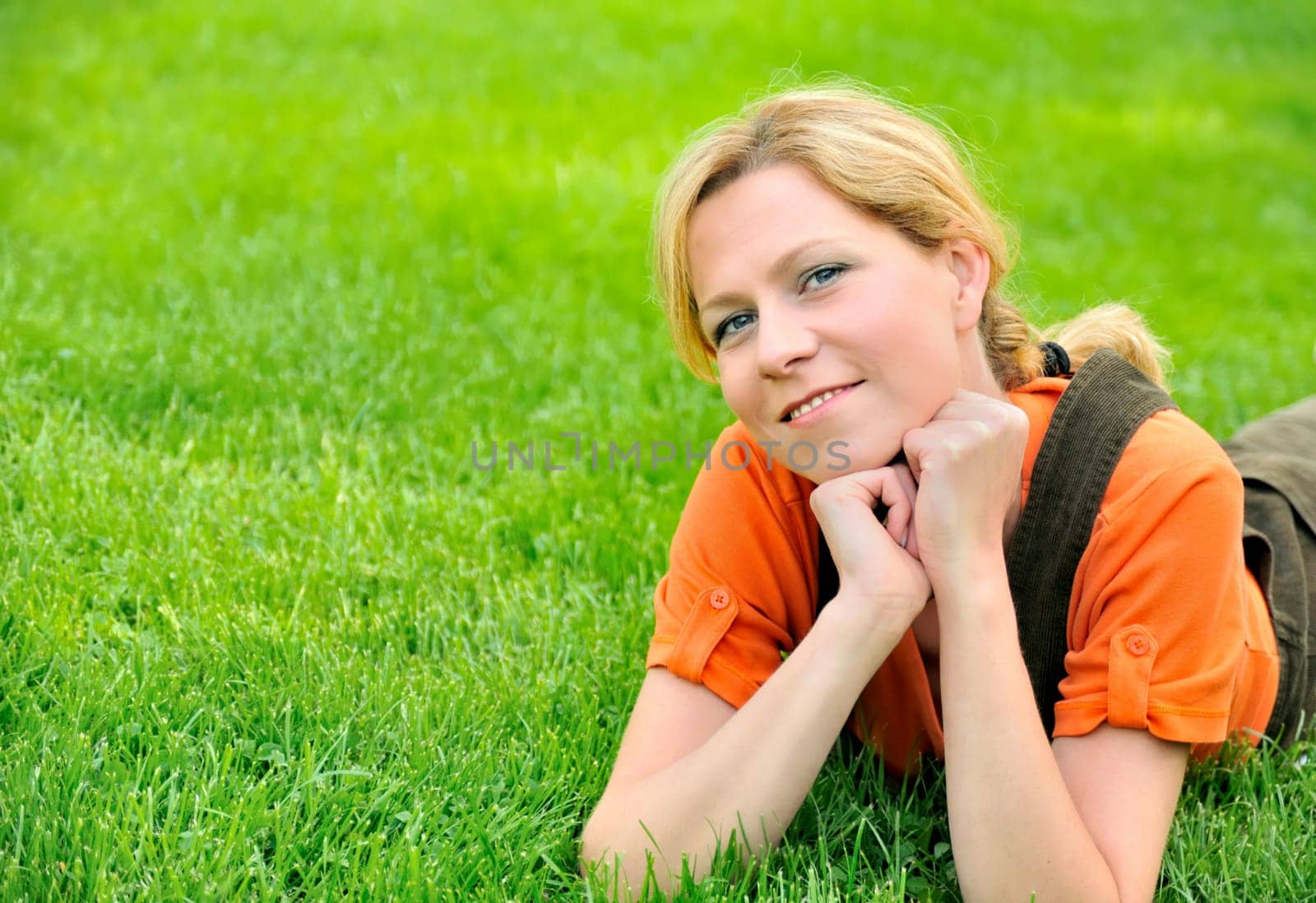 Young woman relaxing on the grass