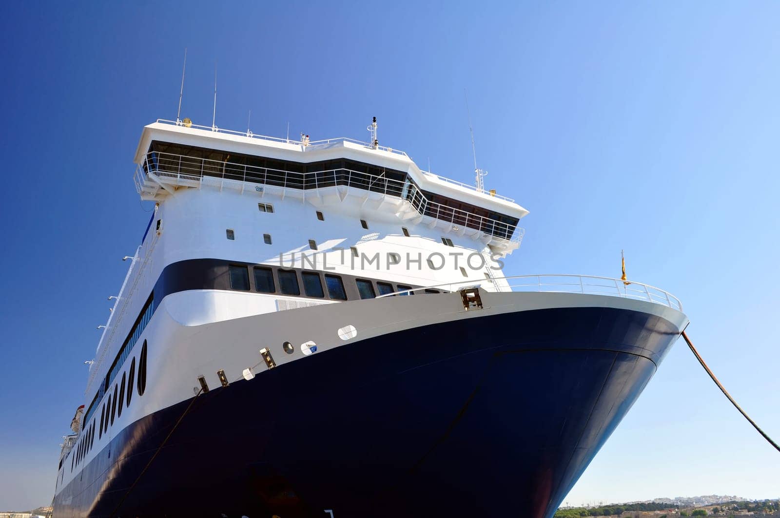 Big ferry boat at mediterranean port.
