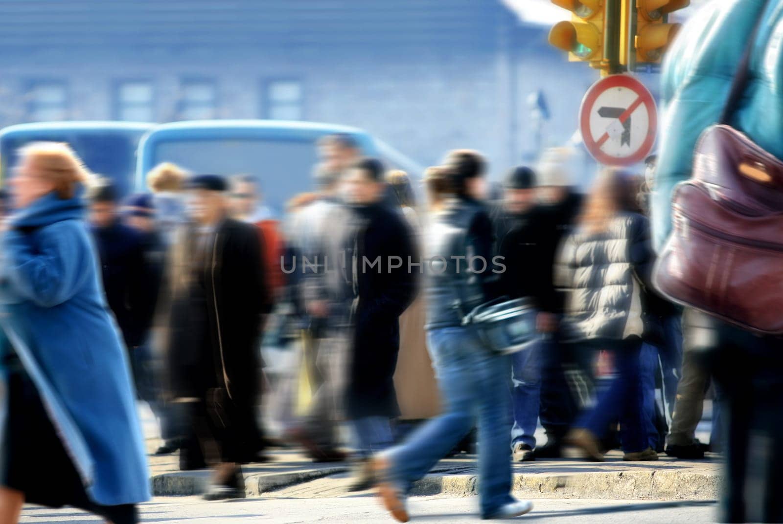 an image of people walking in rush hour