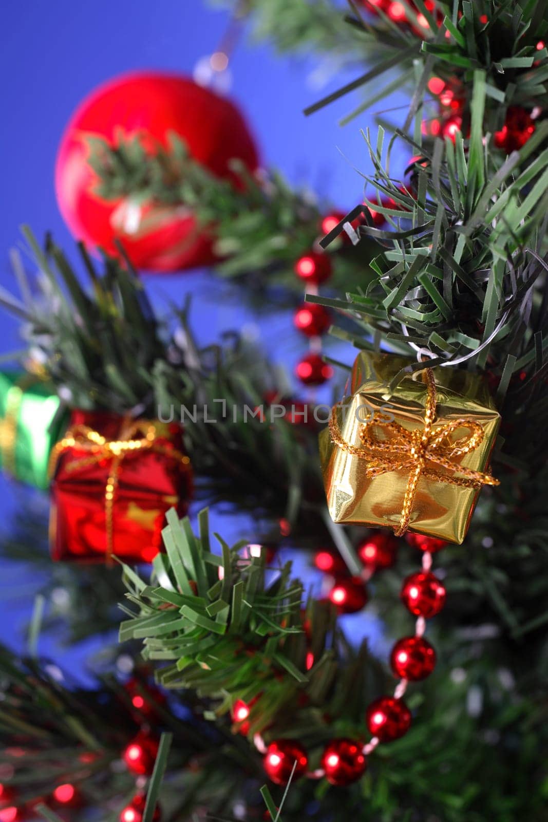 an image of giftboxes with christmas tre