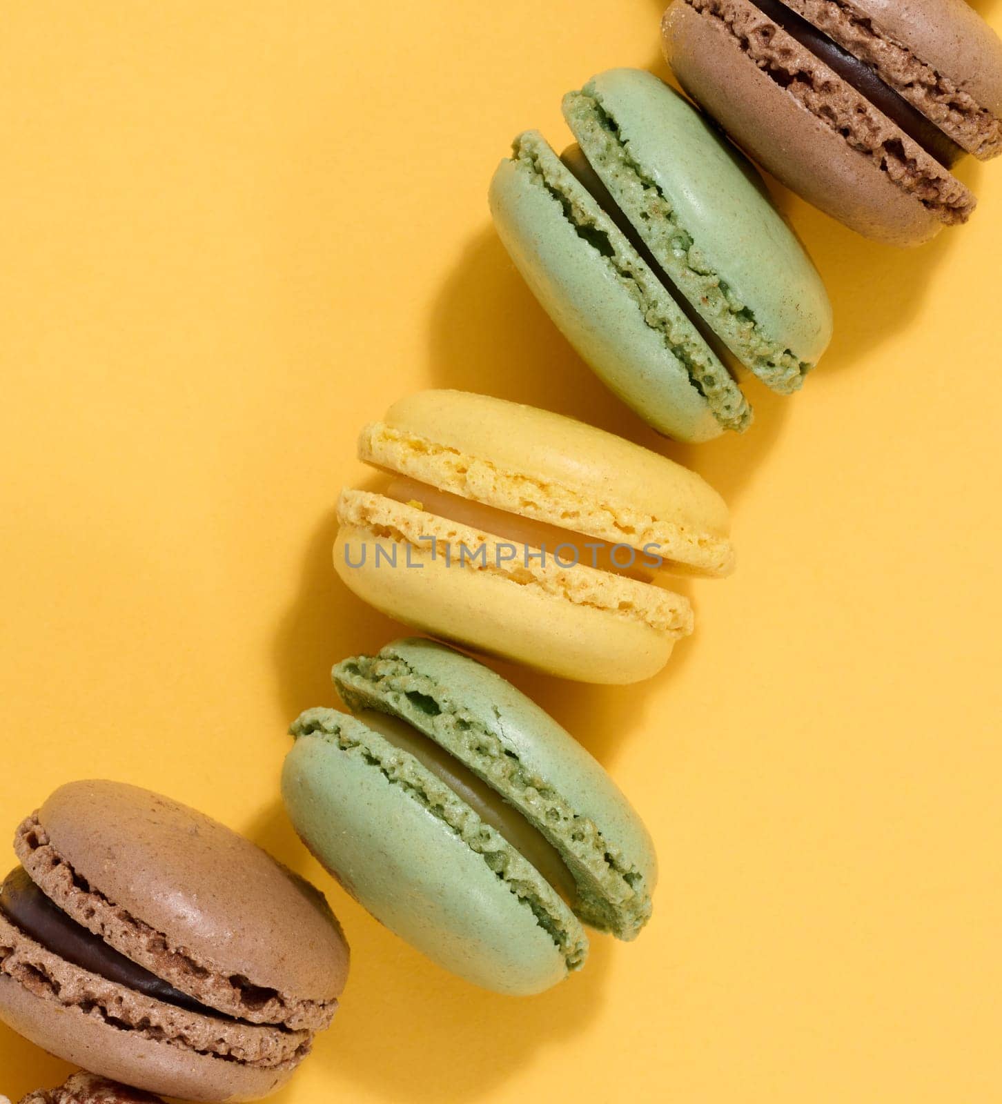 Assortment of colorful macarons, top view