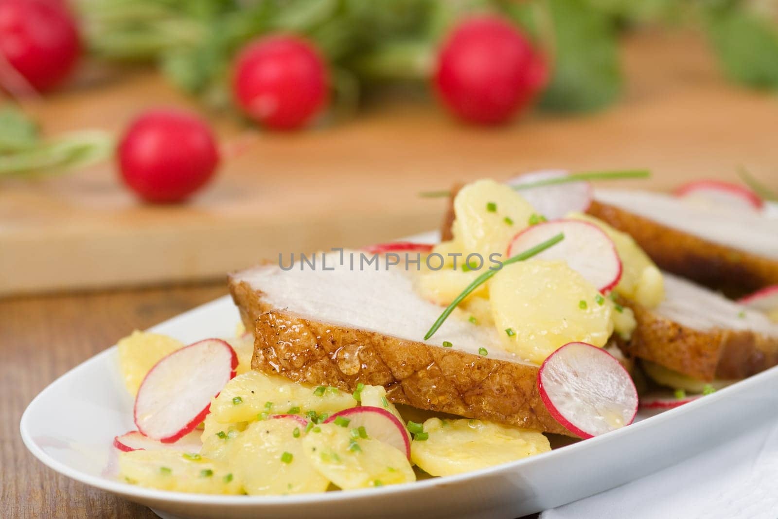 Roast slices with radishes