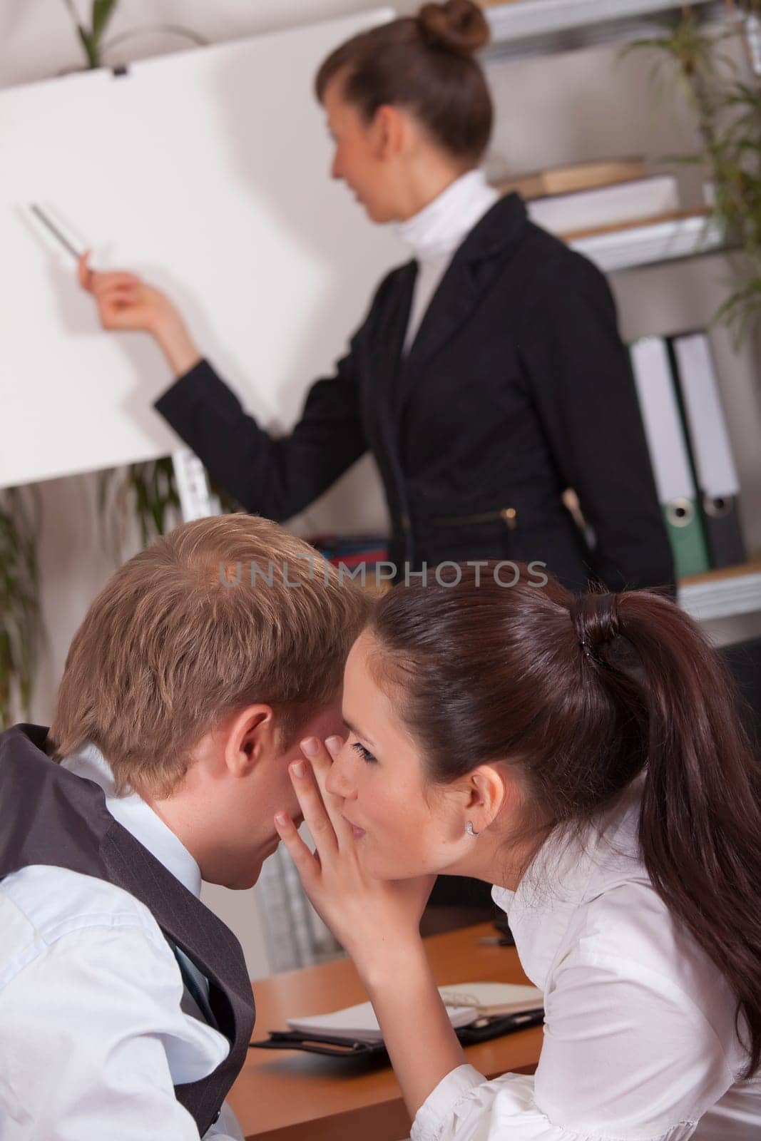 whispering and trouble in conference