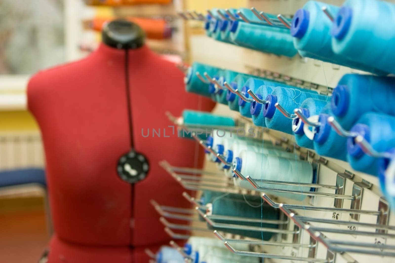 Tailor repairing clothes