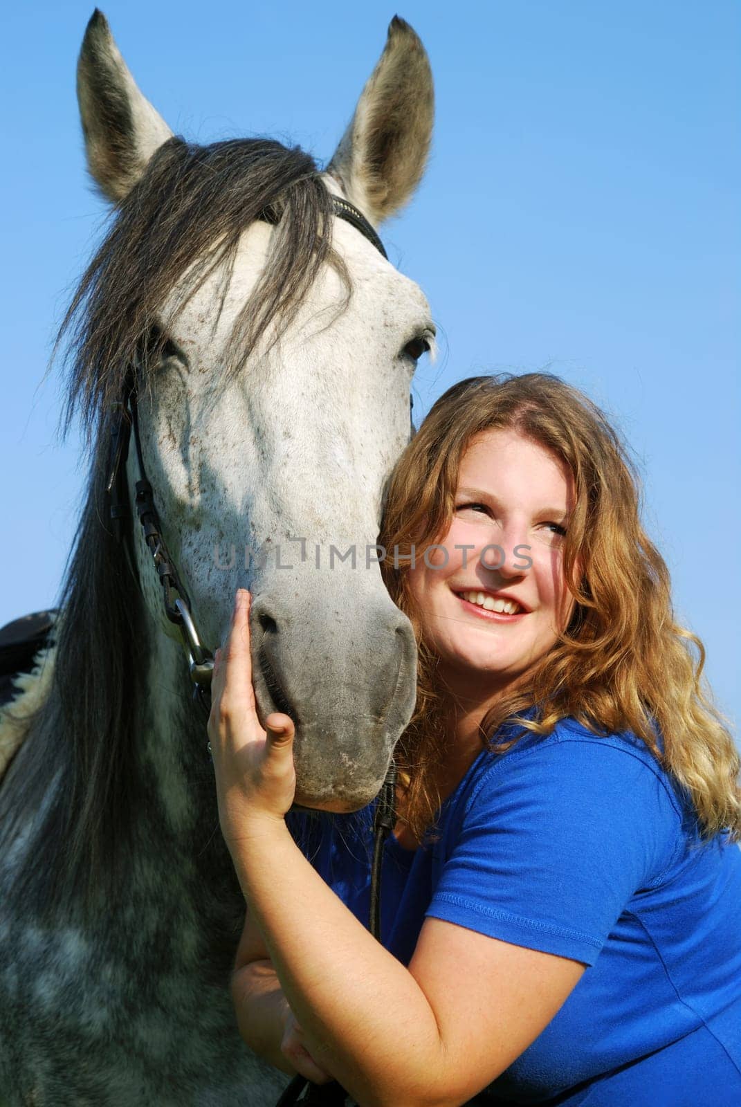 Young woman with horse