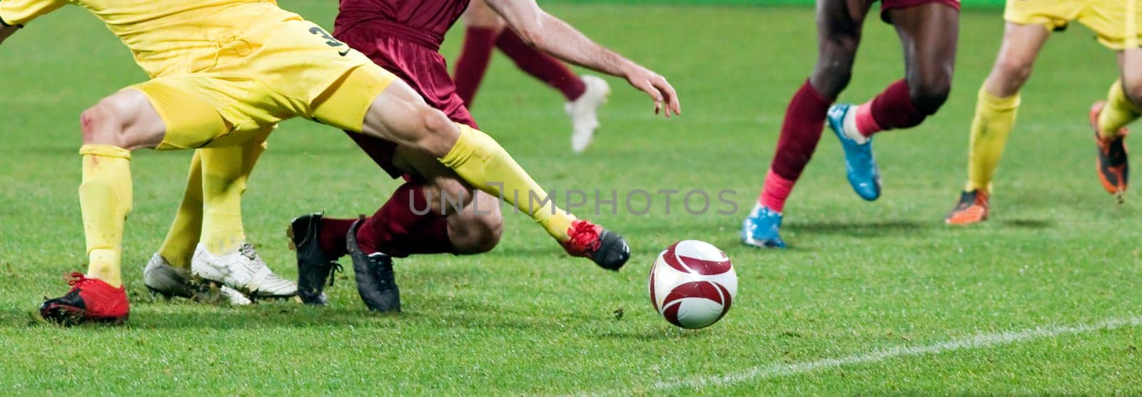 Soccer player kicking the ball