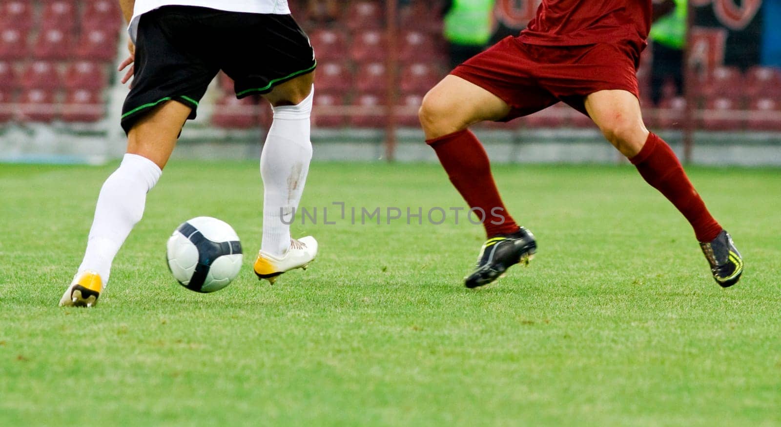 Soccer player kicking the ball