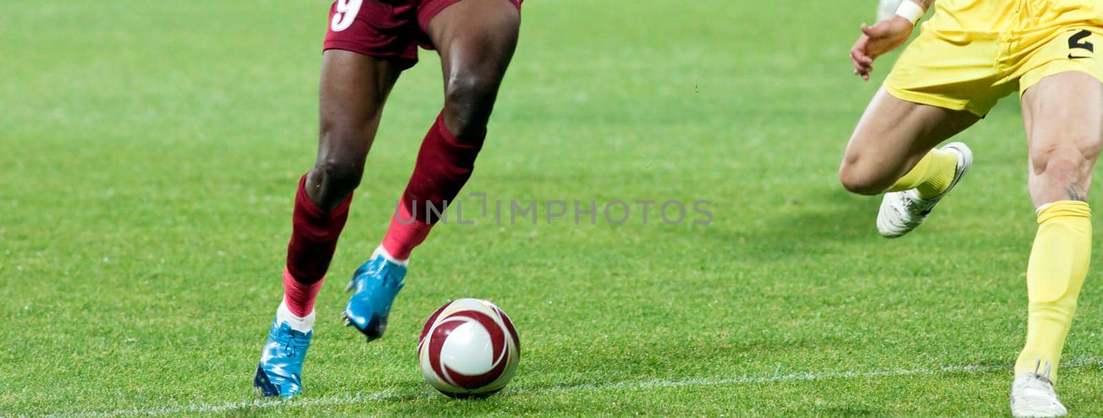 Soccer player kicking the ball