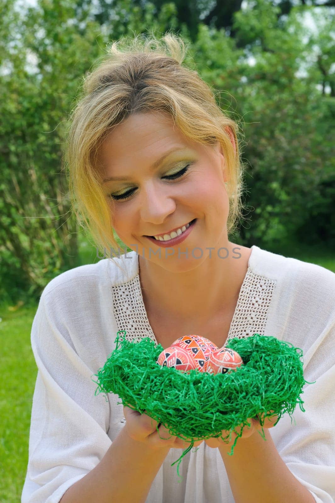 Young woman and easter eggs