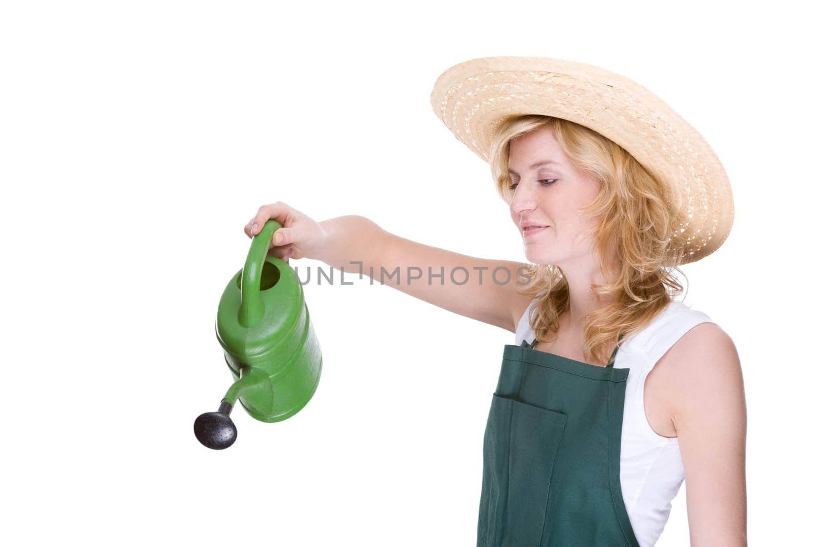 Young gardener with watering can