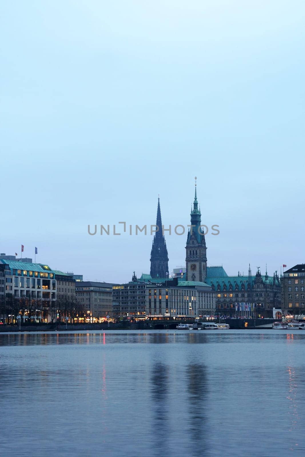 Hamburg's Inner Alster shortly after sunrise on a gray autumn morning
