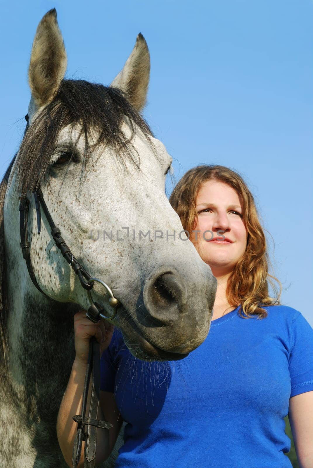 Young woman with horse