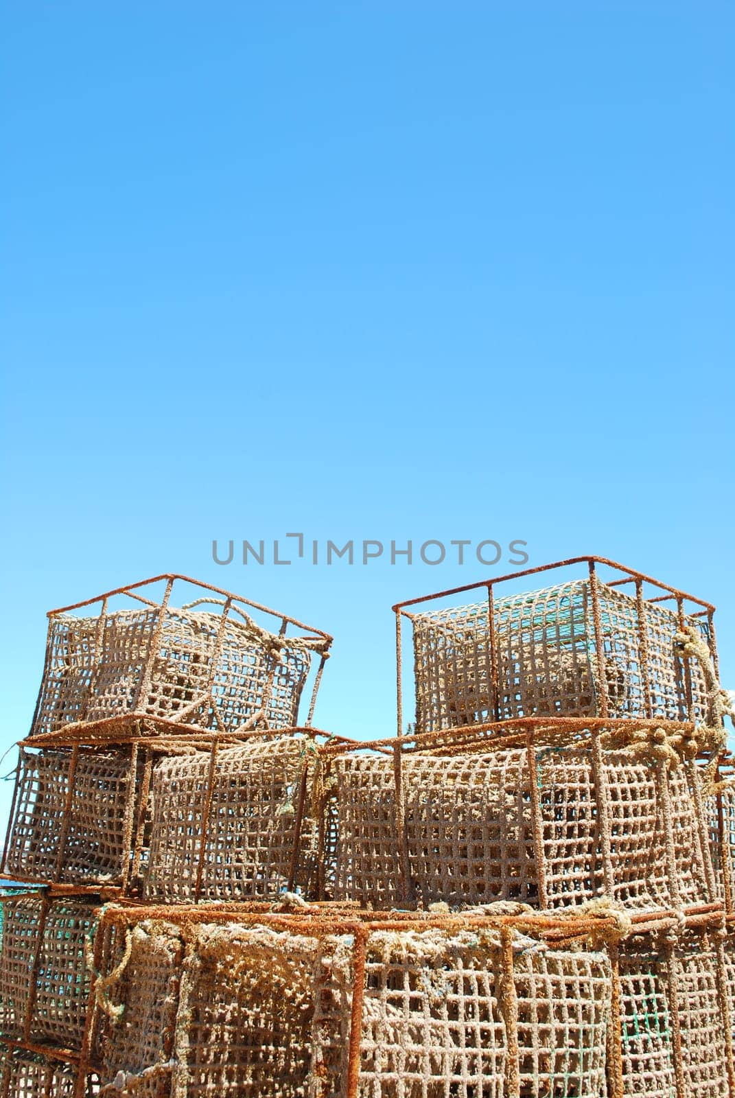 Old fishing cages in the port of Cascais, Portugal