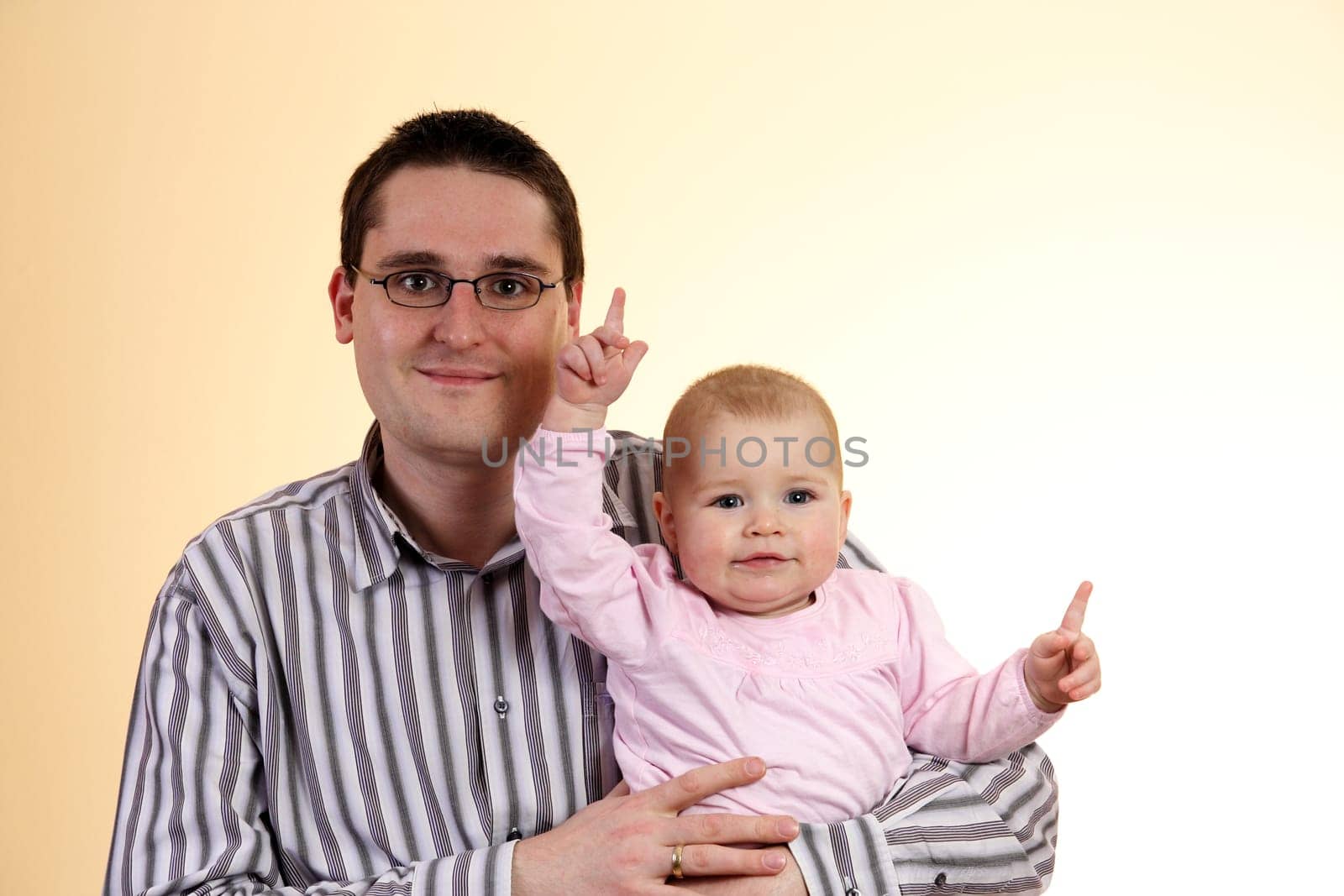 Father with daughter in his arms