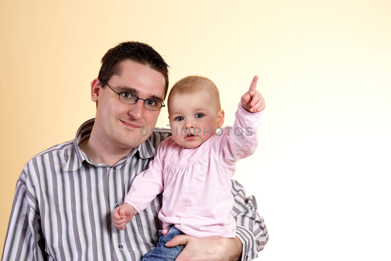 Father with daughter in his arms