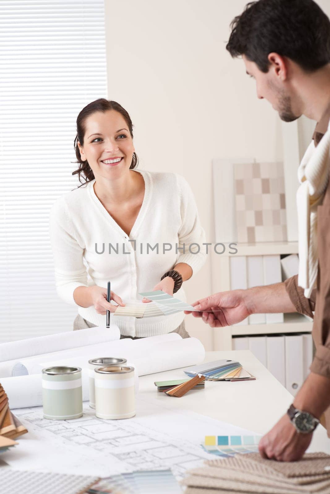 Two interior designer working at office