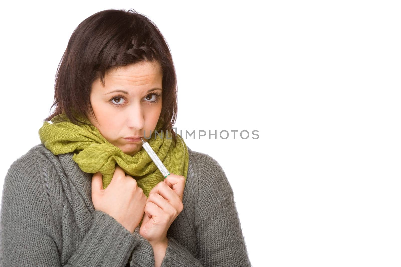 Young woman with a clinical thermometer