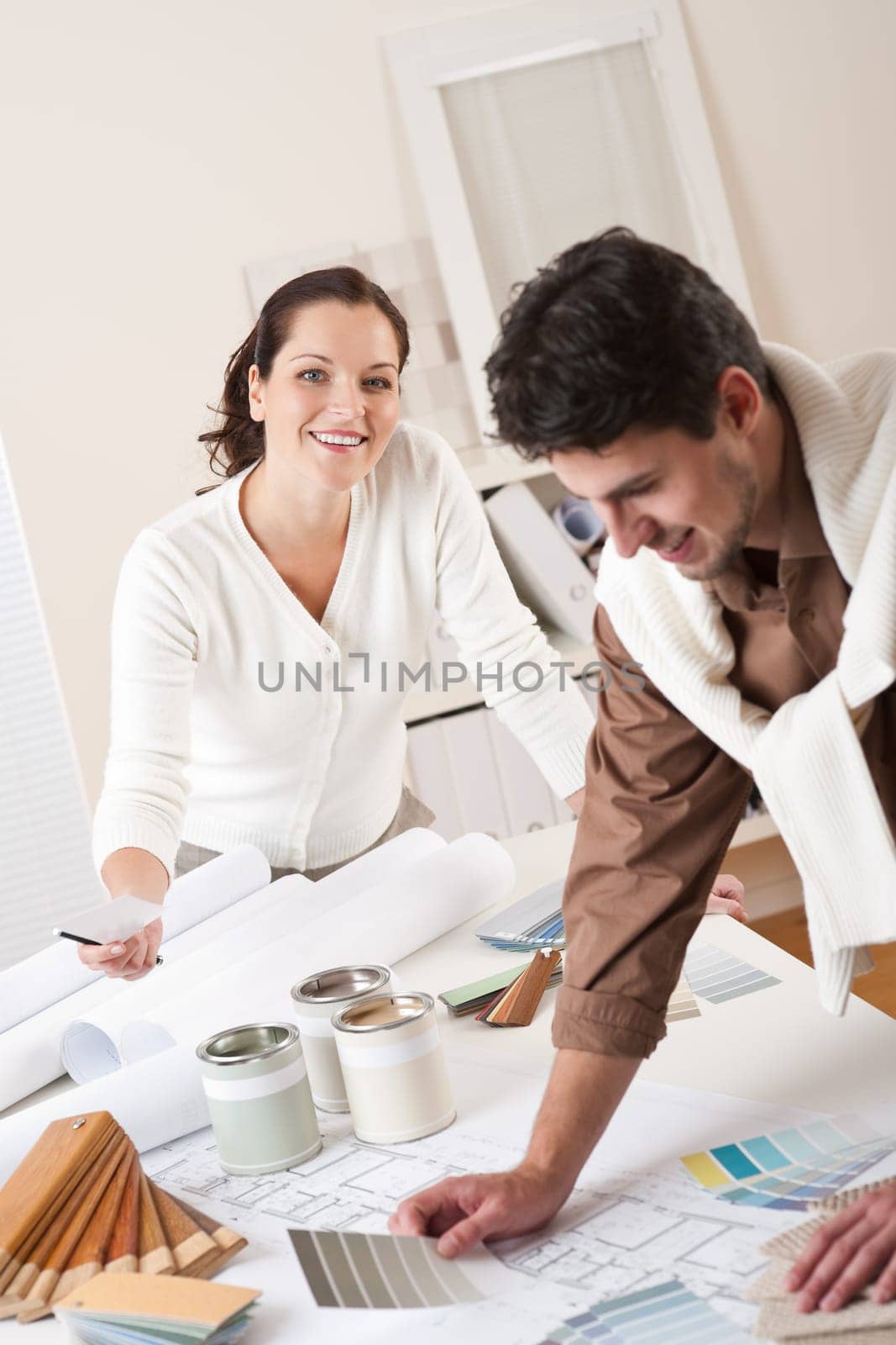 Two interior designer working at office