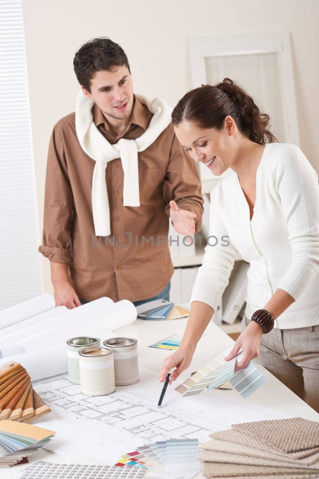 Two interior designer working at office