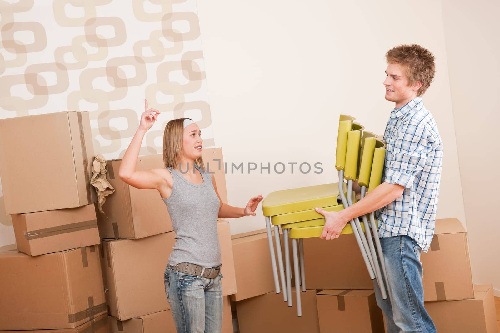 Moving house Couple unpacking box
