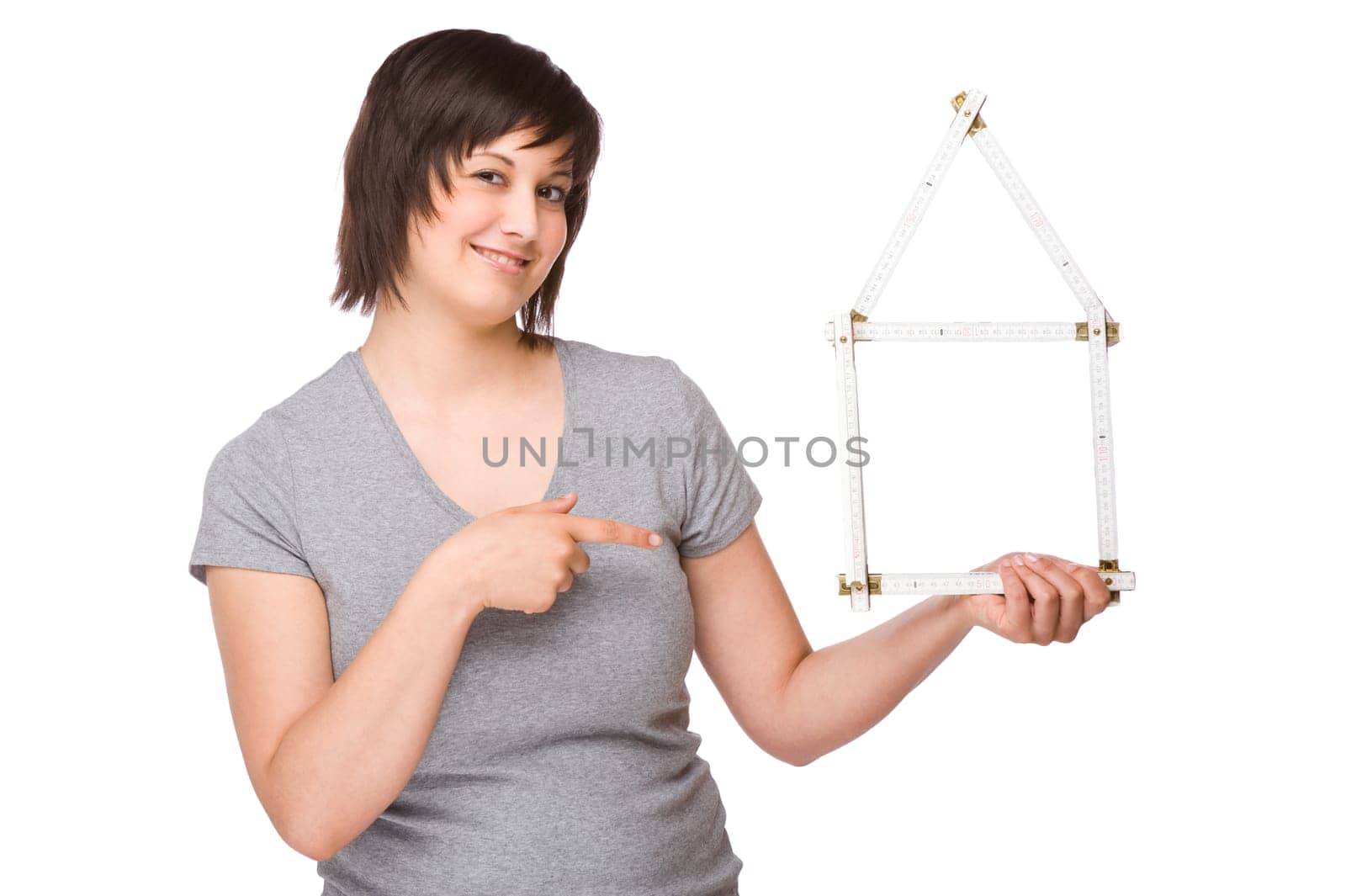 Young woman with a folding rule