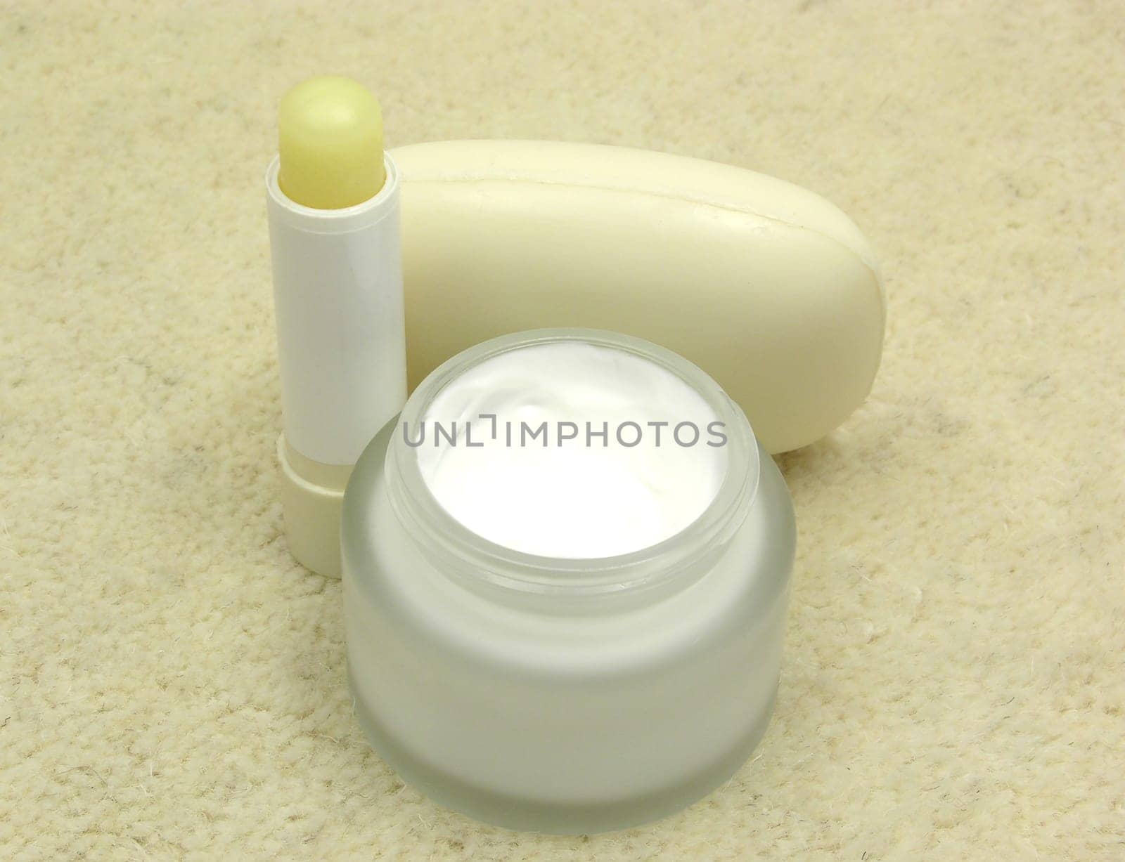 Wellness and toiletries on a fluffy surface