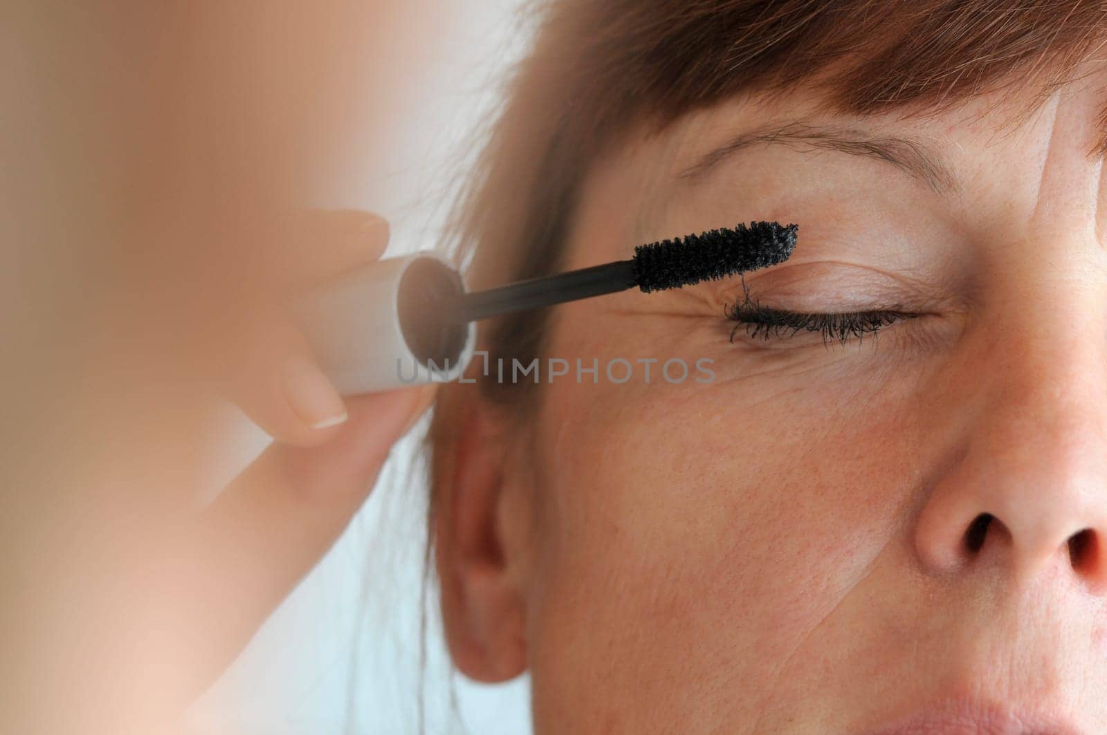 mascara and closed eyes