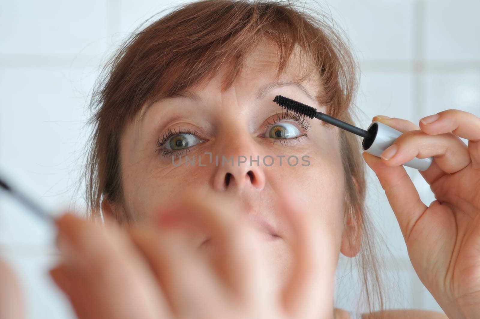 woman and mascara
