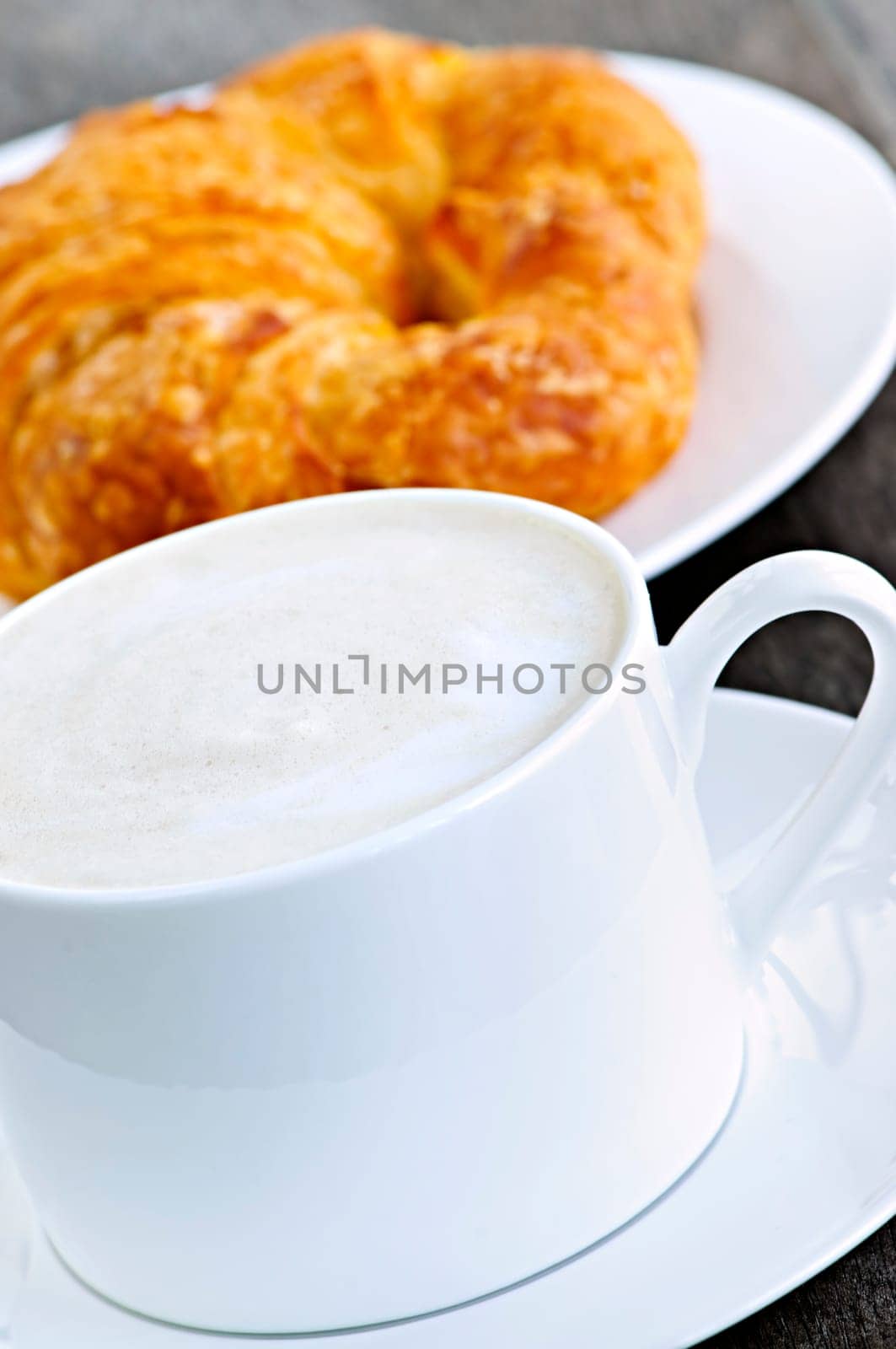 Latte coffee and croissant