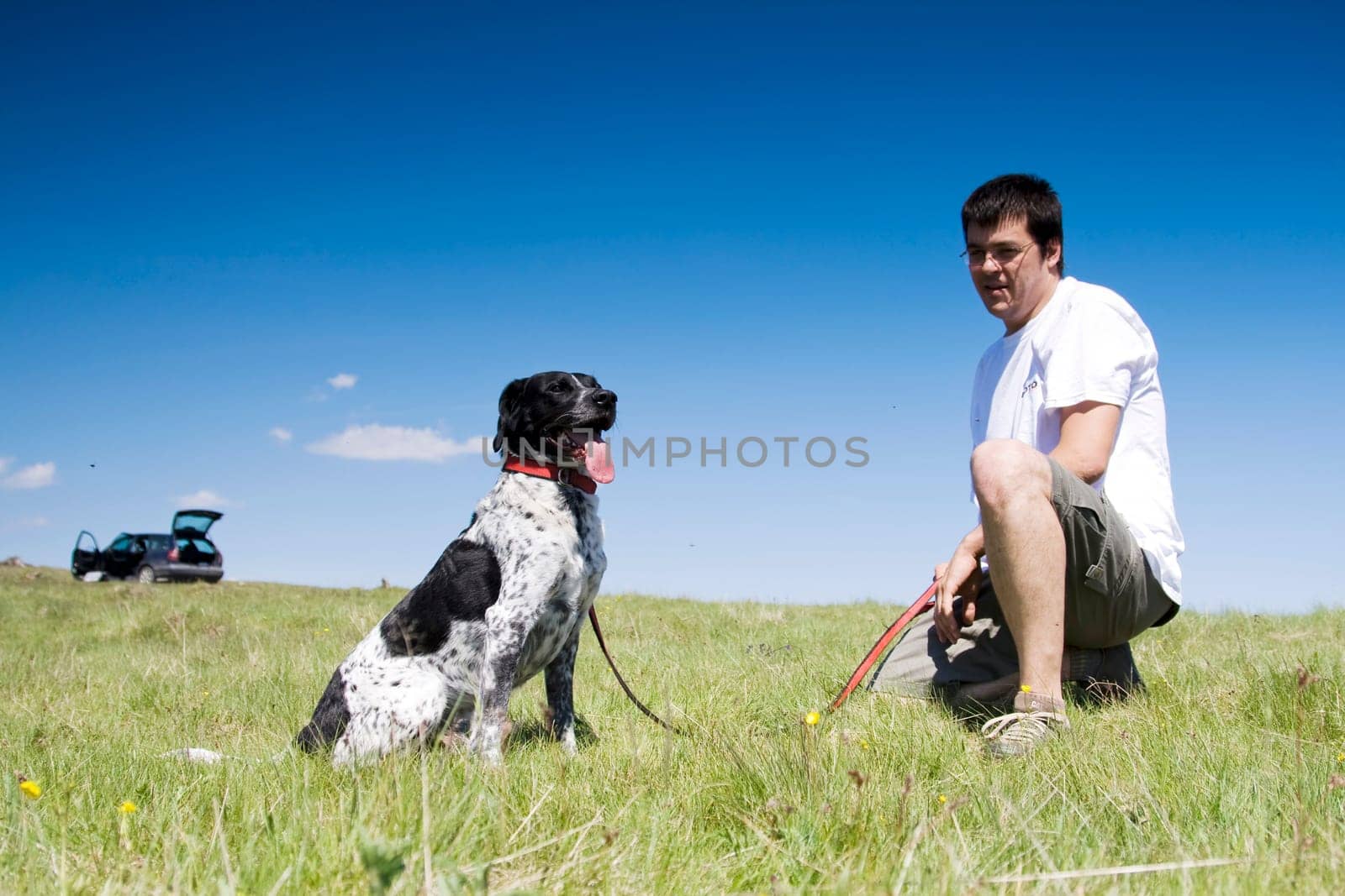 Man playing with his dog